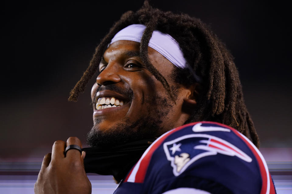 New England Patriots' Cam Newton watches the second half of a preseason NFL football game against the Philadelphia Eagles on Thursday, Aug. 19, 2021, in Philadelphia. (AP Photo/Matt Rourke)