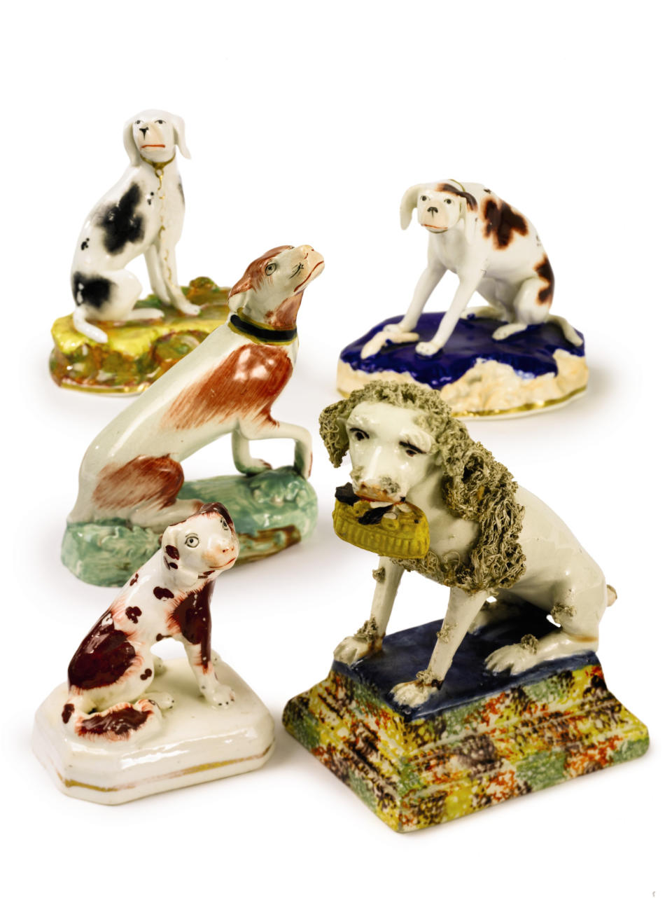 This undated photo provided by Sotheby's shows a group of five seated porcelain dogs that belonged to the late philanthropist Brooke Astor. Sotheby's said the lot will be offered for sale Sept. 24-25, 2012 with some 900 of Astor's personal items from her Park Avenue duplex and her stone manor in Westchester. (AP Photo/Sotheby's)
