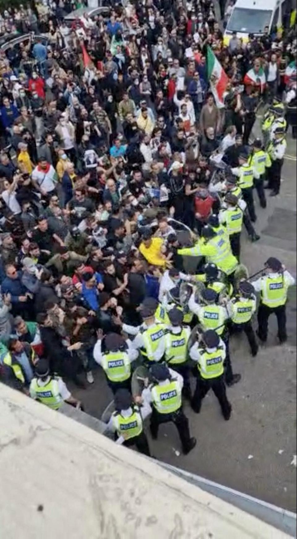 Protesters clash with police during demonstrations following the death of Mahsa Amini in Iran, in London (via REUTERS)