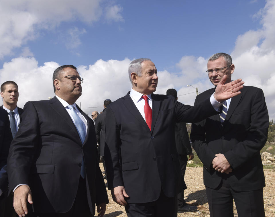 Israeli Prime Minister Benjamin Netanyahu announces a new neighborhood to be built in the Israeli West Bank Israeli settlement of Har Homa, Thursday, Feb. 20, 2020. (Debbie Hill/Pool via AP)