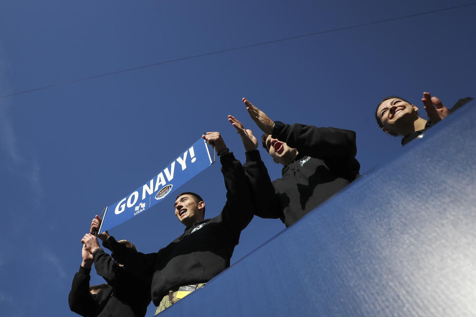 The Navy march-on takes place while fans of the Navy midshipmen cheer before the start of the Army Navy college football game at Lincoln Financial Field in Philadelphia on Saturday, Dec. 10, 2022. (Heather Khalifa/The Philadelphia Inquirer via AP)