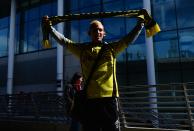 A Borussia Dortmund fan outside Webley Stadium before the game.