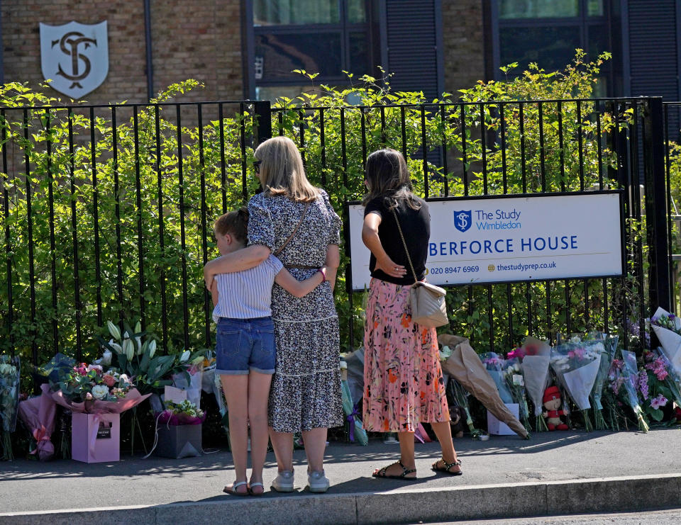 People have been regularly leaving flowers at the scene of the crash in Wimbledon.