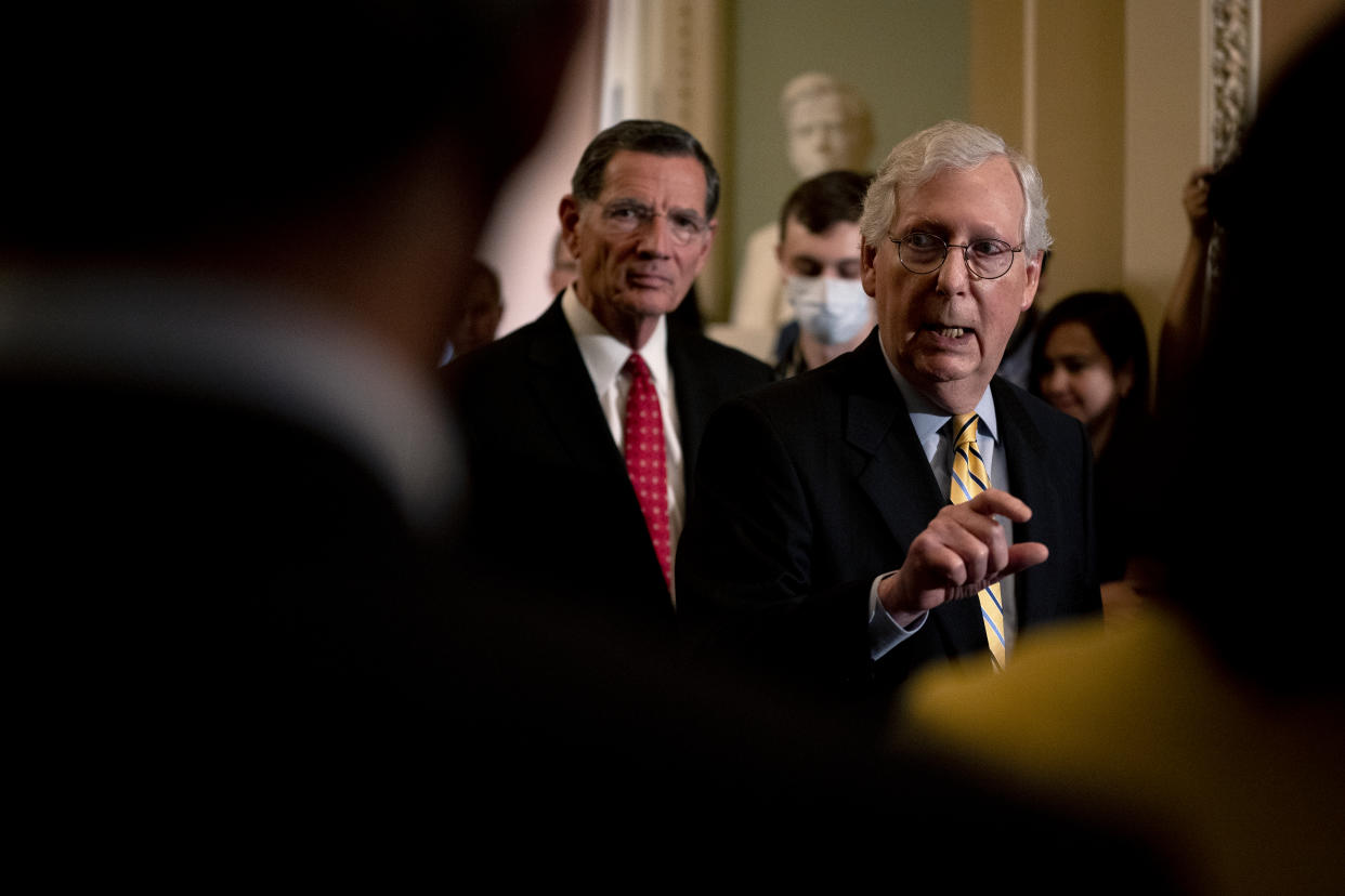 Senate Minority Leader Mitch McConnell, R-Ky., right, at a news conference in the U.S. Capitol on in June.