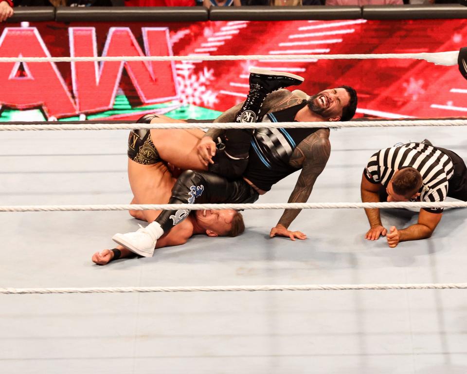 Jey Uso and Ludwig Kaiser battle during "WWE Monday Night Raw" at Wells Fargo Arena in Des Moines.