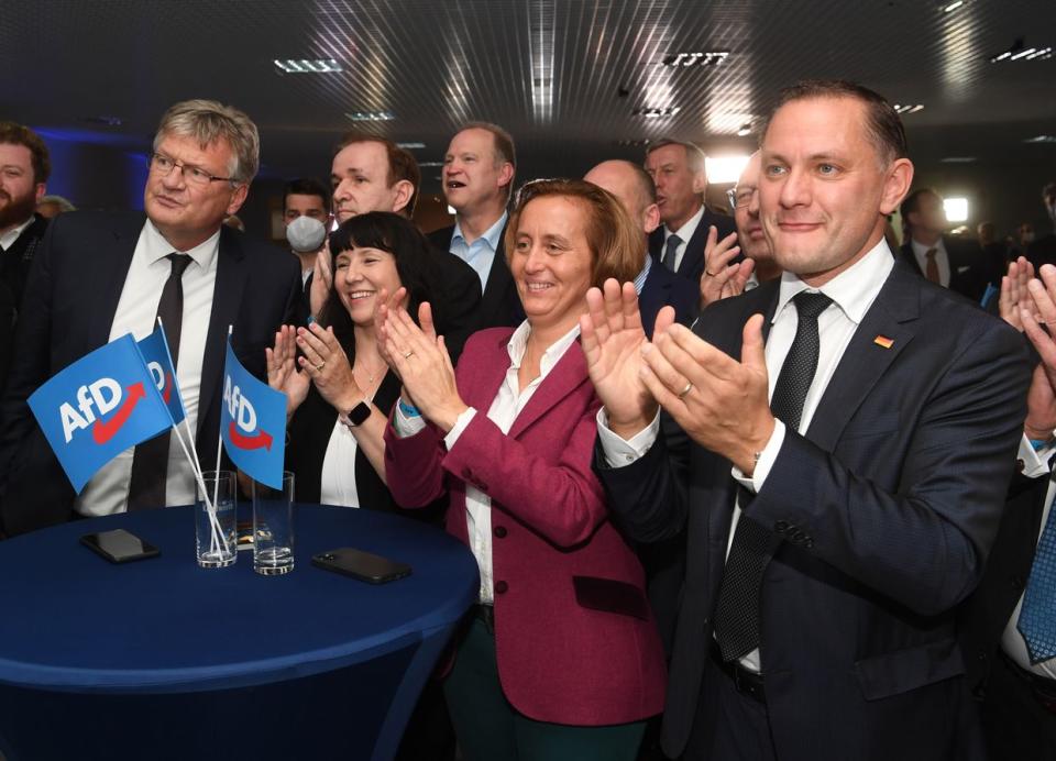 AfD top candidate Tino Chrupalla (R), Beatrix von Storch, deputy federal spokesperson of the AfD, Joana Cotar (L), associate member of the AfD federal executive committee, and Jörg Meuthen, federal spokesperson of the AfD, react to election results on Sept. 26, 2021. (Julian Stratenschulte/picture alliance via Getty Images)