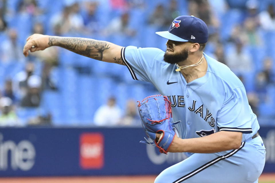 Toronto Blue Jays' Alek Manoha pitches during the first inning in MLB baseball action against the Kansas City Royals in Toronto on Saturday, July 31, 2021. (Jon Blacker/The Canadian Press via AP)