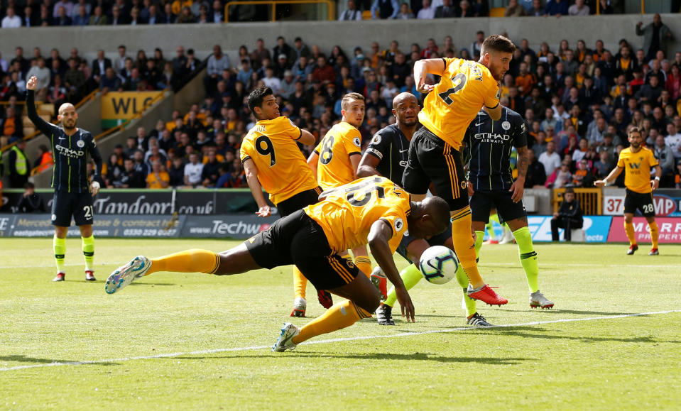 Willy Boly diverts the ball into Manchester City’s net with his arm at Molineux