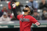 Cleveland Indians' Bobby Bradley celebrates after hitting a solo home run in the fourth inning in the first baseball game of a doubleheader against the Chicago White Sox, Thursday, Sept. 23, 2021, in Cleveland. (AP Photo/Tony Dejak)