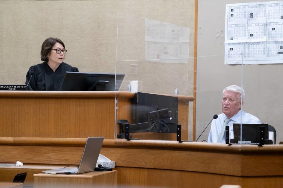 San Luis Obispo Superior Court Judge Jacquelyn Duffy, left, listens as forensic psychiatrist David Fennell testifies in the trial against Stephen Deflaun in San Luis Obispo Superior Court on Apr. 25, 2023.