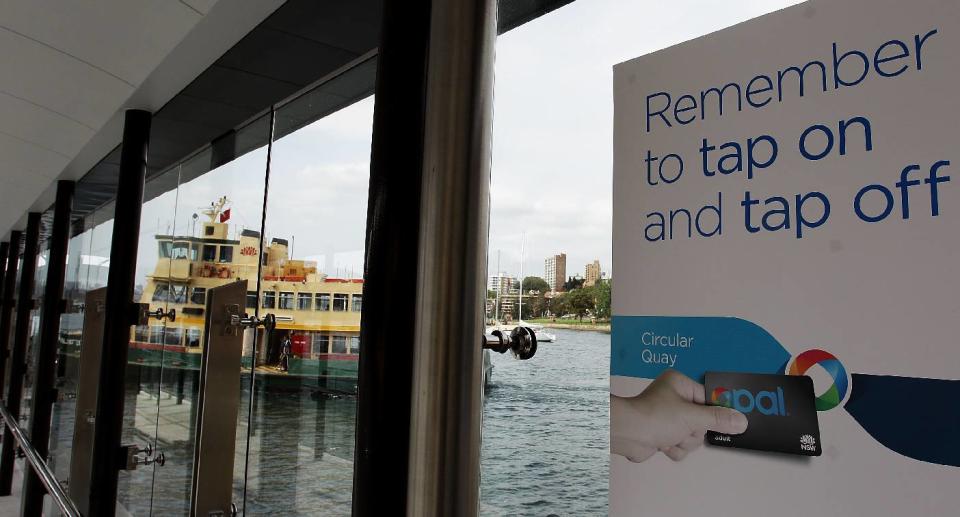 Opal scan off reminder poster on a window of a ferry terminal. Source: Getty Images