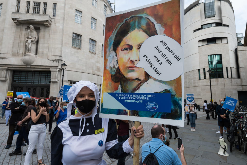 NHS staff protest outside BBC Broadcasting House before marching to Trafalgar Square through central London to demand 15% pay rise for NHS workers on 12 September, 2020 in London, England. Protesters demonstrate against not being included in the government's pay deal for 900,000 public sector workers amid the sacrifices and hardship experienced during the coronavirus pandemic. (Photo by WIktor Szymanowicz/NurPhoto via Getty Images)