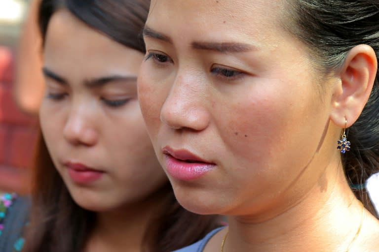 Chit Su Win (L) and Panei Mon (R), who are married to jailed Myanmar journalists Kyaw Soe Oo and Wa Lone, were despondent after the ruling