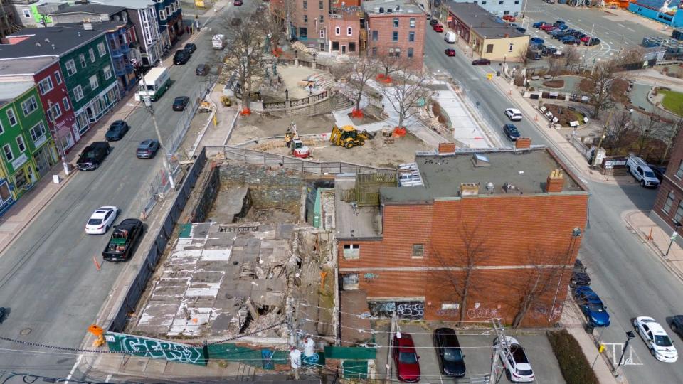 The old Breakwater Books building on Water Street in St. John's is located on the right of this aerial photo, and has been vacant and neglected for more than a decade. The fenced off section on the left, which fronts onto Duckworth Street, is the former site of the Roebothan McKay and Marshall law firm, which burned in 2010. The property has now been purchased by the provincial government in order to expand the footprint of the war memorial (background).