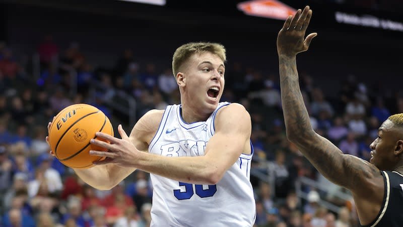 Brigham Young Cougars guard Dallin Hall (30) drives during the Big 12 conference championship against UCF in Kansas City, Mo., on Wednesday, March 13, 2024. BYU won 87-73.