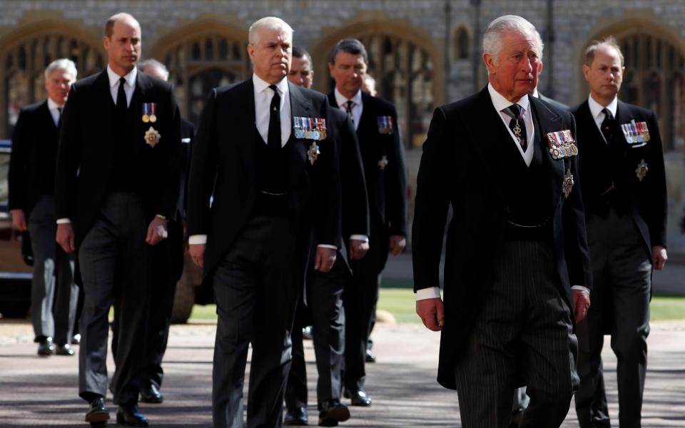 Prince Charles leads the funeral procession for his father, followed by Prince Andrew, Prince Edward, Prince William, Peter Phillips and Prince Harry - Alastair Grant/Pool via Reuters