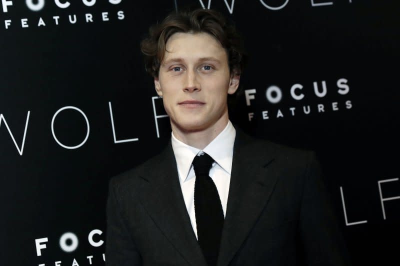 George Mackay arrives on the red carpet for a special screening of the film "Wolf" in New York City on December 2, 2021. The actor turns 32 on March 13. File Photo by Peter Foley/UPI