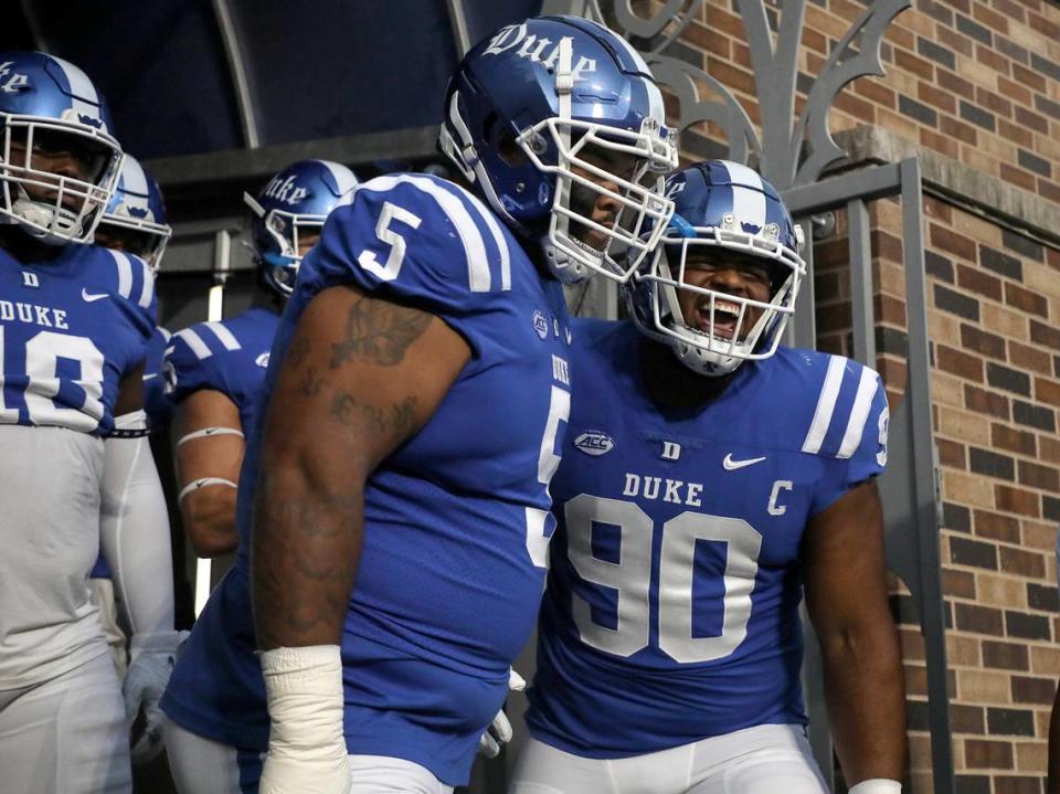 Duke’s DeWayne Carter (90) yells as he takes the field for pre-game warmups prior to the Blue Devils’ game against Notre Dame at Wallace Wade Stadium on Saturday, Sept. 30, 2023, in Durham, N.C.