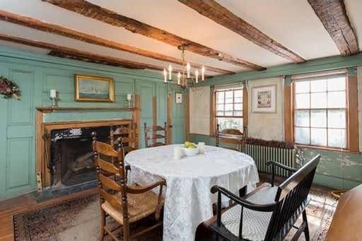 The home's historic features include the original fireplaces and King's wood beams.