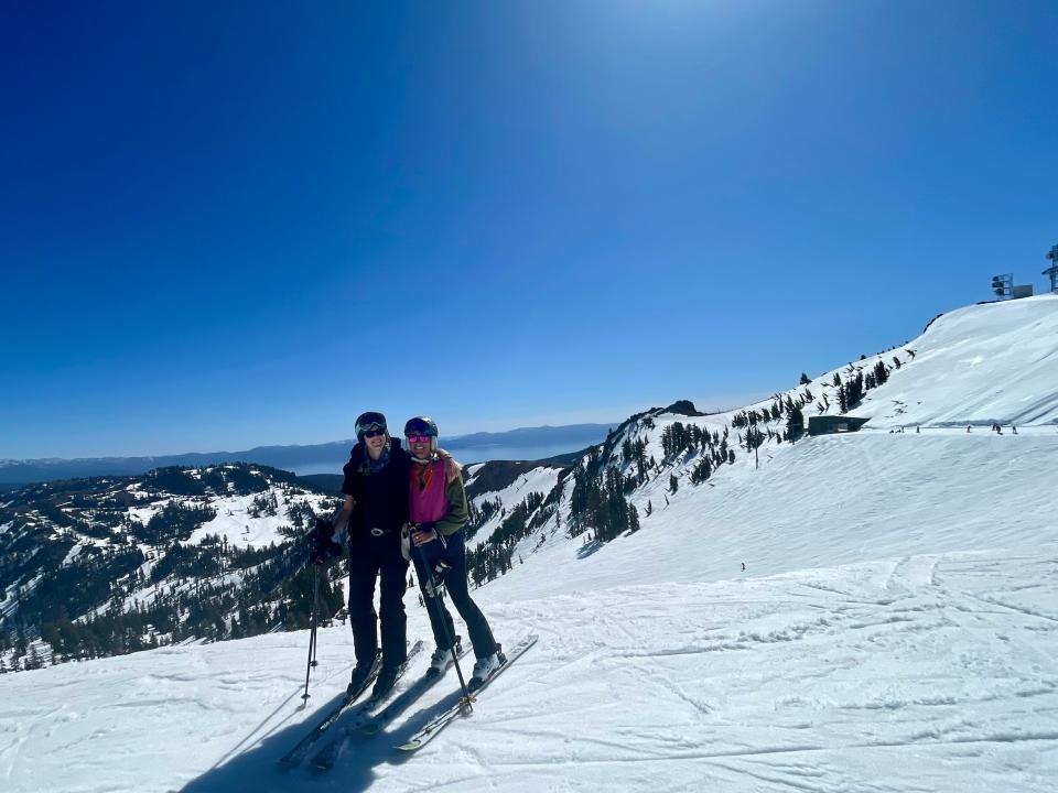 Katherine Parker-Maygar and her friend on snowy mountains in california with skiis