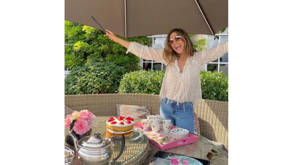 Elizabeth Hurley in the gardens at her Hereforshire home. 