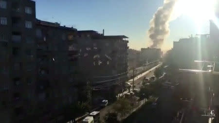 Smoke rises from an explosion in a central district of Diyarbakir, the largest city in Turkey's mainly Kurdish southeast, in this still image taken from video November 4, 2016. REUTERS/Reuters TV