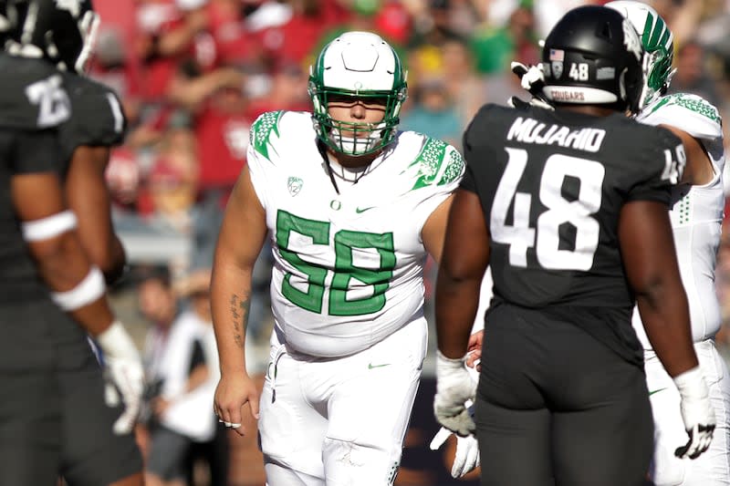 Oregon offensive lineman Jackson Powers-Johnson (58) stands on the field during the second half of an NCAA college football game against Washington State, Saturday, Sept. 24, 2022, in Pullman, Wash. | Young Kwak