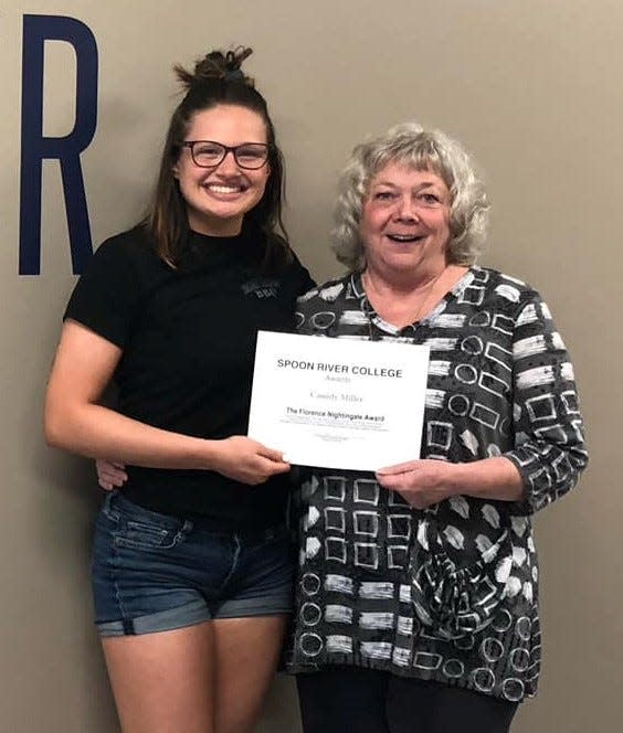 Spoon River College nursing graduate Cassidy Miller was the recipient of the Florence Nightingale Award at the Canton Campus. Presenting the award was nursing faculty Barb Strauch.