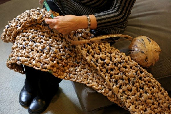 An example of plarn, which combines thick yarn with plastic shopping bags.