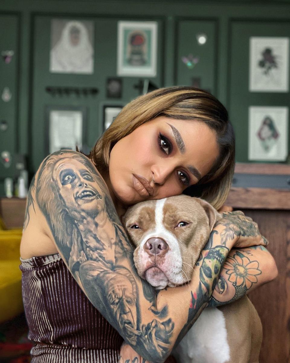 Lora Arellano and her pitbull.