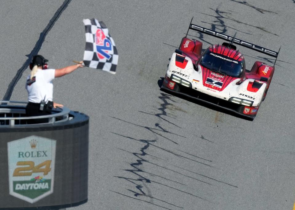 Felipe Nasr drives the No. 7 Porsche 963 to win the Rolex 24 on Sunday at Daytona at Daytona International Speedway. An inflex of race fans also generated a winning weekend for area hoteliers and merchants in Volusia County.