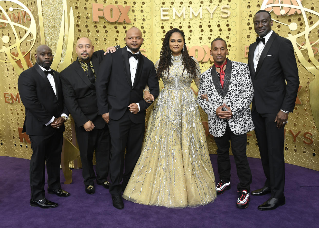 From left to right: Antron McCray, Raymond Santana, Kevin Richardson, Ava DuVernay, Korey Wise and Yusef Salaam arrive for the 71st Emmy Awards. (Photo: Frazer Harrison via Getty Images)