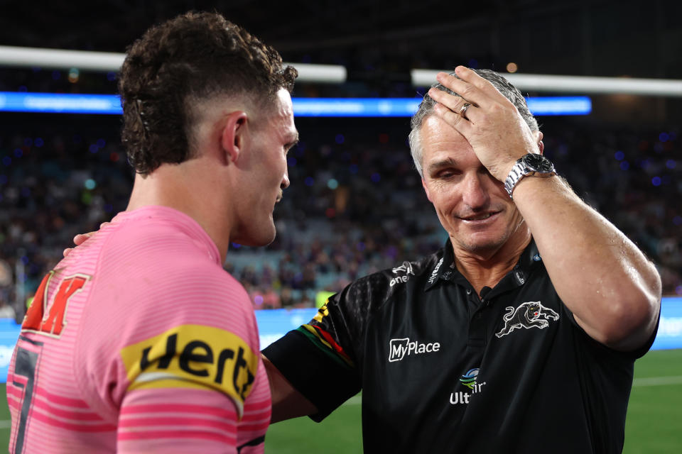 Nathan Cleary celebrates with his father and coach Ivan Cleary.