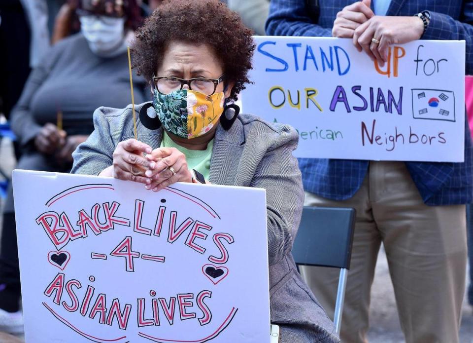 Trudy Williams of Prairie Village attended the vigil to support the Asian community. Williams and her husband George Williams organized Stand Up for Black Lives Prairie Village. On Sunday, March 28, 2021, about 500 people turned out in the West Bottoms’ Cafe Cà Phê to honor the victims of the Atlanta-area mass shooting of mostly Asian women March 16.