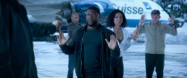 <p>Netflix</p> Russ Bain as Vaxby, Kevin Hart as Cyrus, Gugu Mbatha-Raw as Abby and Billy Magnussen as Magnus in Netflix's 'Lift'