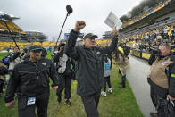 Jacksonville Jaguars head coach Doug Pederson, center, celebrates after the team defeated the Pittsburgh Steelers during an NFL football game Sunday, Oct. 29, 2023, in Pittsburgh. (AP Photo/Gene J. Puskar)