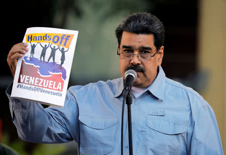 FILE PHOTO: Venezuela's President Nicolas Maduro attends a gathering in support of his government in Caracas, Venezuela February 7, 2019. REUTERS/Carlos Barria/File Photo