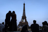 The Eiffel Tower is decorated with the Olympic rings ahead of the 2024 Summer Olympics, Wednesday, July 17, 2024, in Paris. (AP Photo/David Goldman)