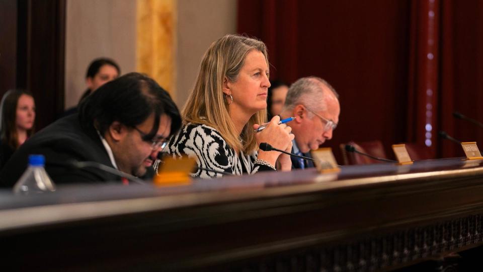 PHOTO: State Sen. Kristina Roegner, R-Ohio, listens to Rep. Gary Click, R-Ohio, speak at a hearing for the Saving Adolescents from Experimentation (SAFE) Act at the Ohio Statehouse, Nov. 15, 2023, in Columbus, Ohio.  (The Washington Post via Getty Images, FILE)