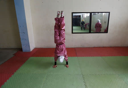 A student of the Shaolin Wushu club practices in Kabul, Afghanistan January 19, 2017. REUTERS/Mohammad Ismail