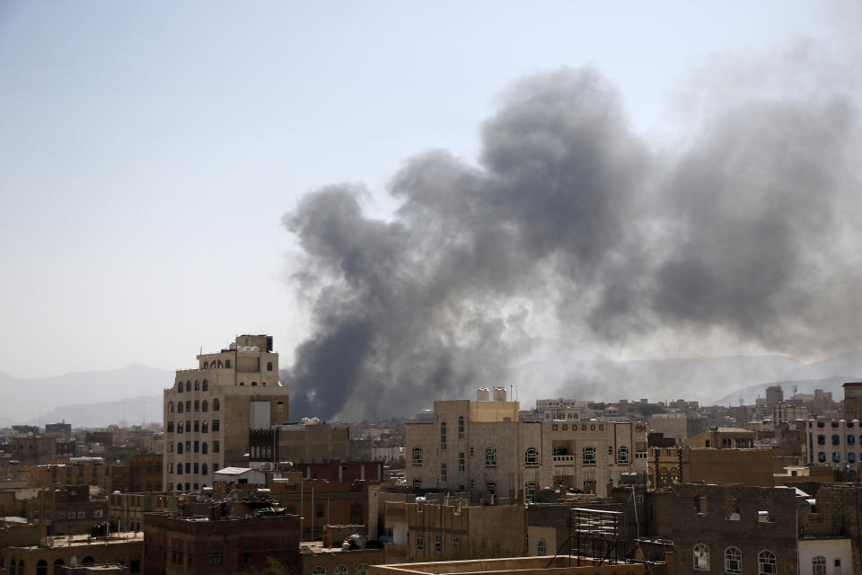 SANA'A, YEMEN - MARCH 07: Smoke billows above the residential area following airstrikes of the Saudi-led coalition targeting Houthi-held military positions on March 07, 2021 in Sana'a, Yemen. (Photo by Mohammed Hamoud/Getty Images)