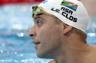 Chad le Clos of South Africa rests after his swim in a men's 200-meter butterfly semifinal at the 2020 Summer Olympics, Tuesday, July 27, 2021, in Tokyo, Japan. (AP Photo/Martin Meissner)