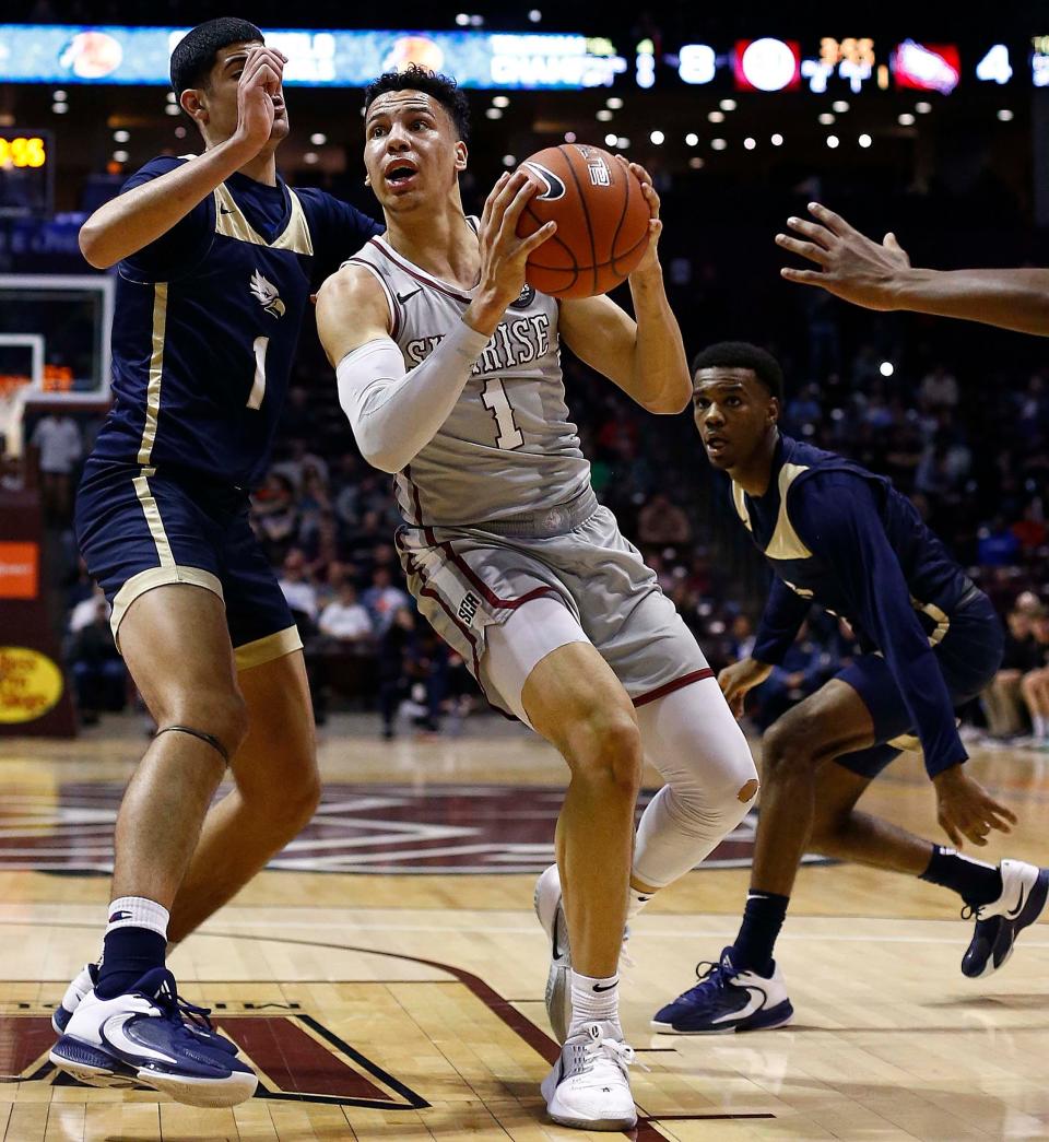 Images of Calvary Christian against Sunrise Christian during Tournament of Champions action at Great Southern Bank Arena on January 13, 2023.