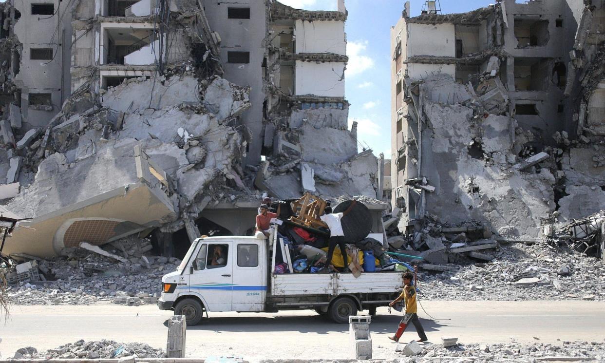 <span>Palestinians heading for the so-called humanitarian zone in al-Mawasi after an IDF evacuation order this month.</span><span>Photograph: Habboub Ramez/Abaca/Rex/Shutterstock</span>