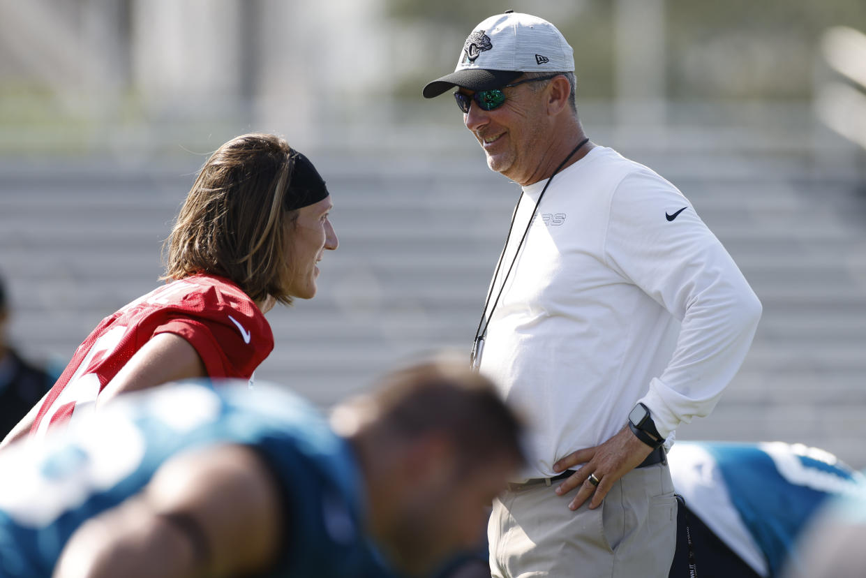 JACKSONVILLE, FL - JULY 28: Jacksonville Jaguars Head Coach Urban Meyer talks with Jacksonville Jaguars Quarterback Trevor Lawrence (16) during training camp on July 28, 2021 at DreamFinders Homes Practice Complex in Jacksonville, Fl. (Photo by David Rosenblum/Icon Sportswire via Getty Images)