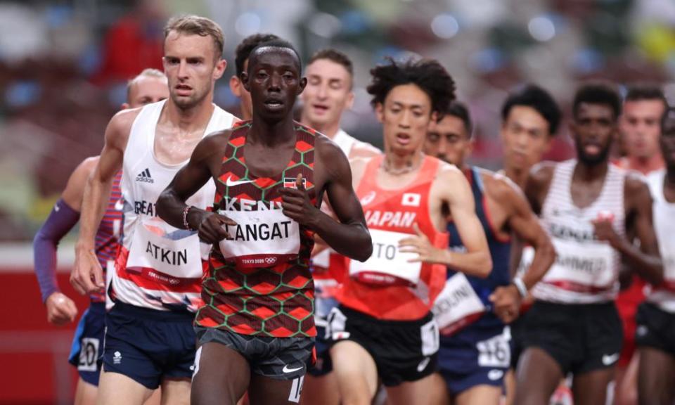 Weldon Kipkurui Langat of Kenya and Sam Atkin of Britain in action in the 10,000m.