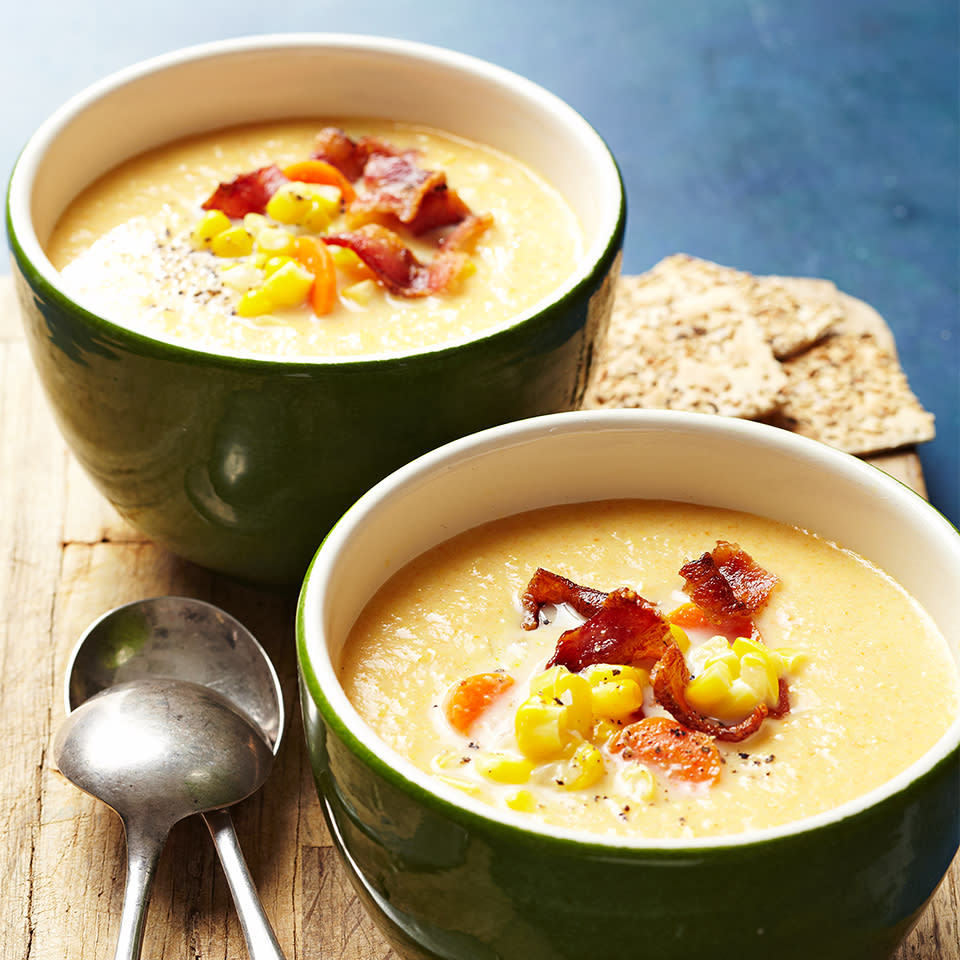 <p>Using fat-free milk and reduced-sodium chicken broth makes this classic corn soup a healthier option, but still allows for a creamy taste. Sprinkle some bacon on top for a punch of extra flavor and crunch. <a href="https://www.eatingwell.com/recipe/264900/creamy-corn-soup-with-crispy-bacon/" rel="nofollow noopener" target="_blank" data-ylk="slk:View Recipe" class="link ">View Recipe</a></p>