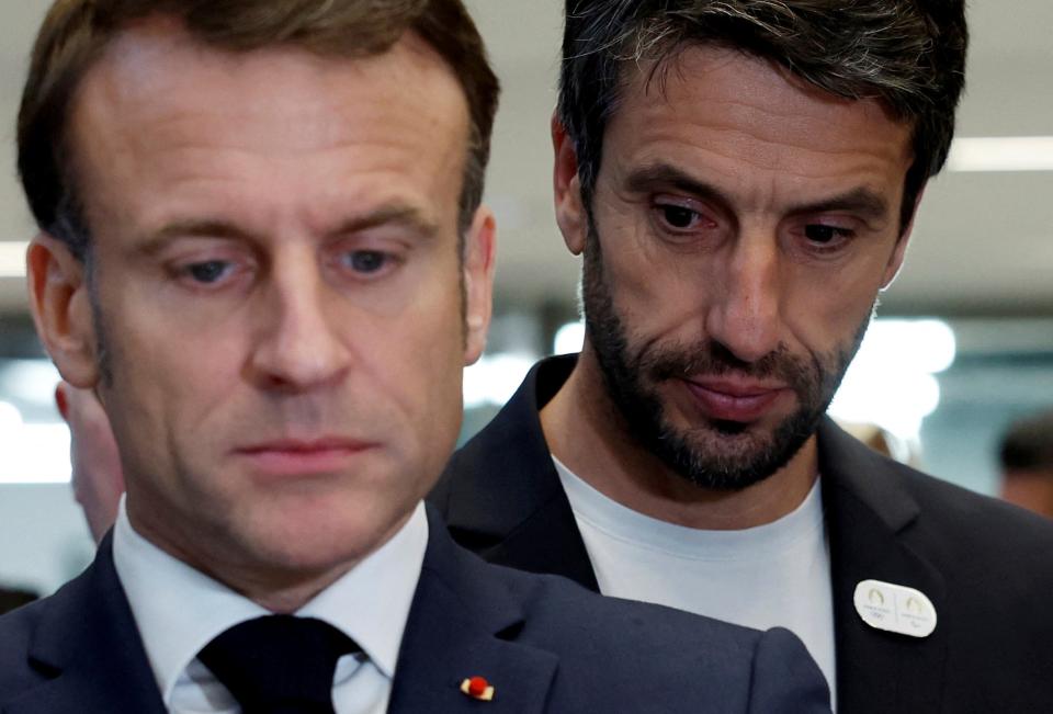 French President Emmanuel Macron and Tony Estanguet, president of the Paris 2024 Olympics Organising Committee, attend the inauguration of the Olympic Aquatics Center (CAO) in Saint-Denis, near Paris (AP)