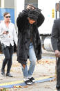 <p>Never afraid to push the fashion boundaries, Rihanna pairs bright white socks with black strap sandals while on set of “Ocean’s Eight” in New York City. <i> (Photo: Raymond Hall/GC Images) </i> </p>