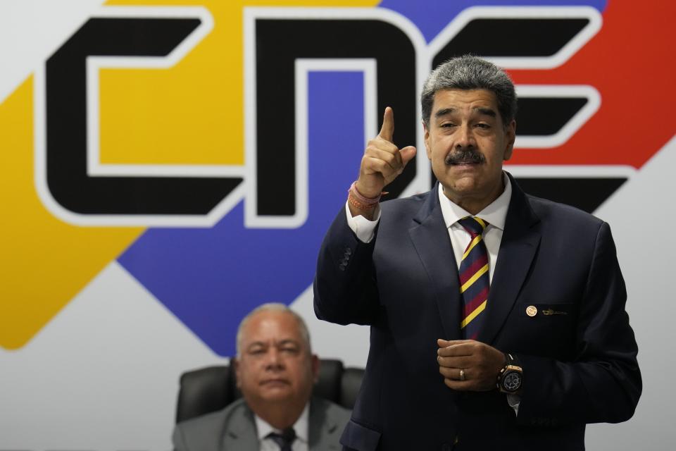 Venezuelan President Nicolas Maduro speaks after signing an agreement to respect the results of the upcoming presidential elections, at the National Electoral Council headquarters in Caracas, Venezuela, Thursday, June 20, 2024. (AP Photo/Ariana Cubillos)
